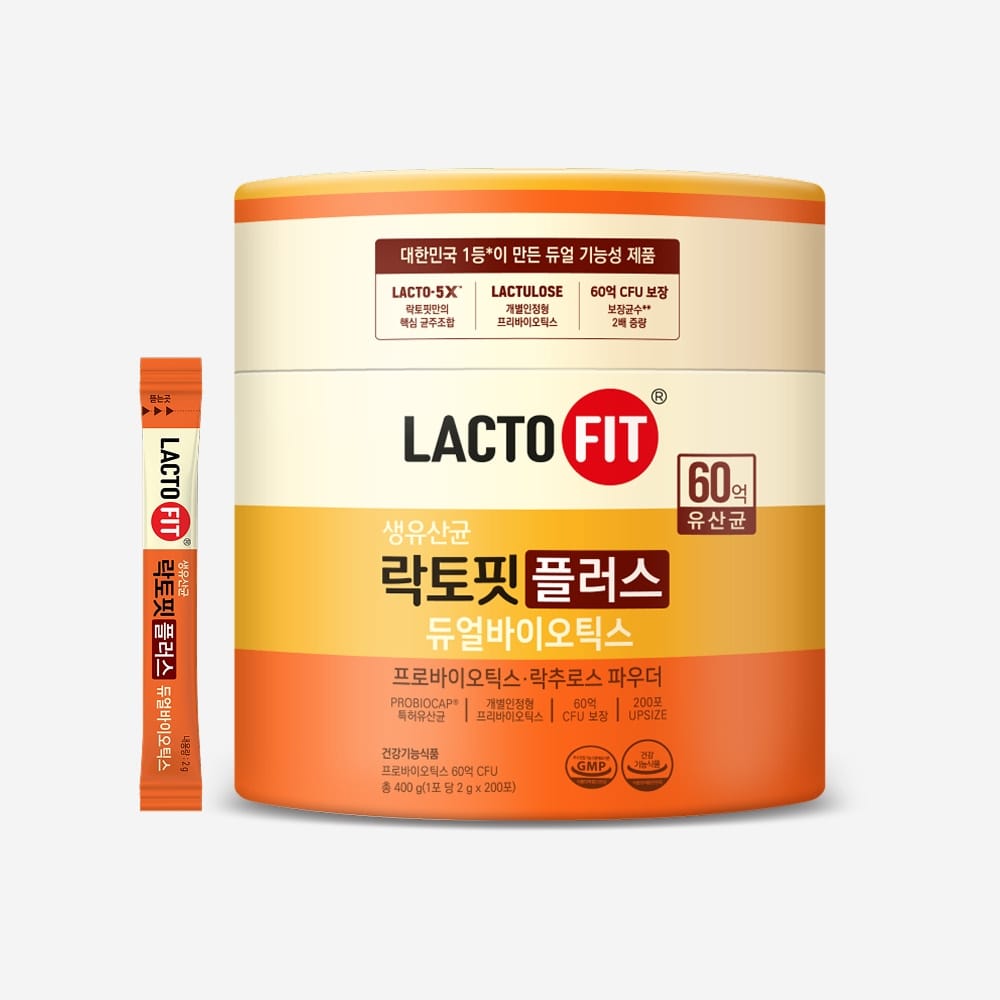 Lacto Fit Plumper probiotic supplement container in orange and cream with a single orange sachet standing beside it on a light gray background.